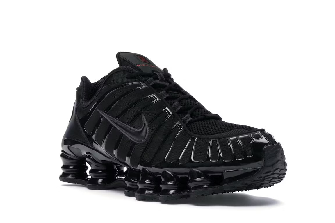 Nike Shox TL en blanco y plateado metalizado
