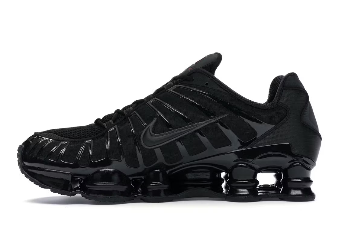 Nike Shox TL en blanco y plateado metalizado