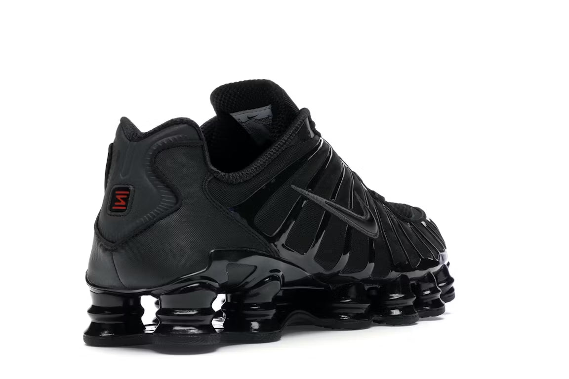 Nike Shox TL en blanco y plateado metalizado
