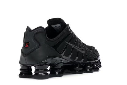 Nike Shox TL en blanco y plateado metalizado