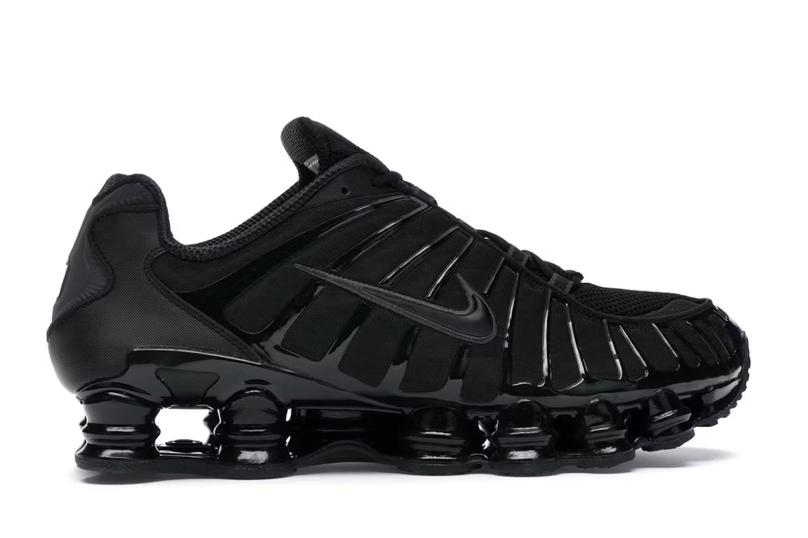 Nike Shox TL en blanco y plateado metalizado